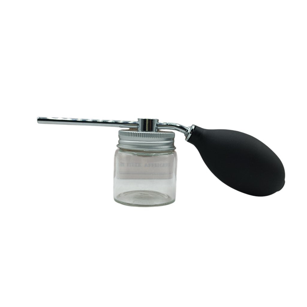 Hair fiber applicator product image for barber hair enhancement and grooming service.