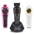 Three professional cordless hair trimmers, one in pink, one in black, and one in white, displayed vertically next to each other on a stand, with the brand name visible.