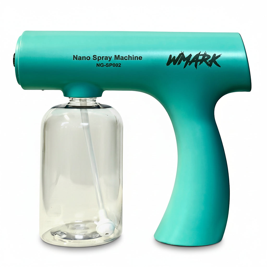 Turquoise nano spray machine with clear container on a white surface