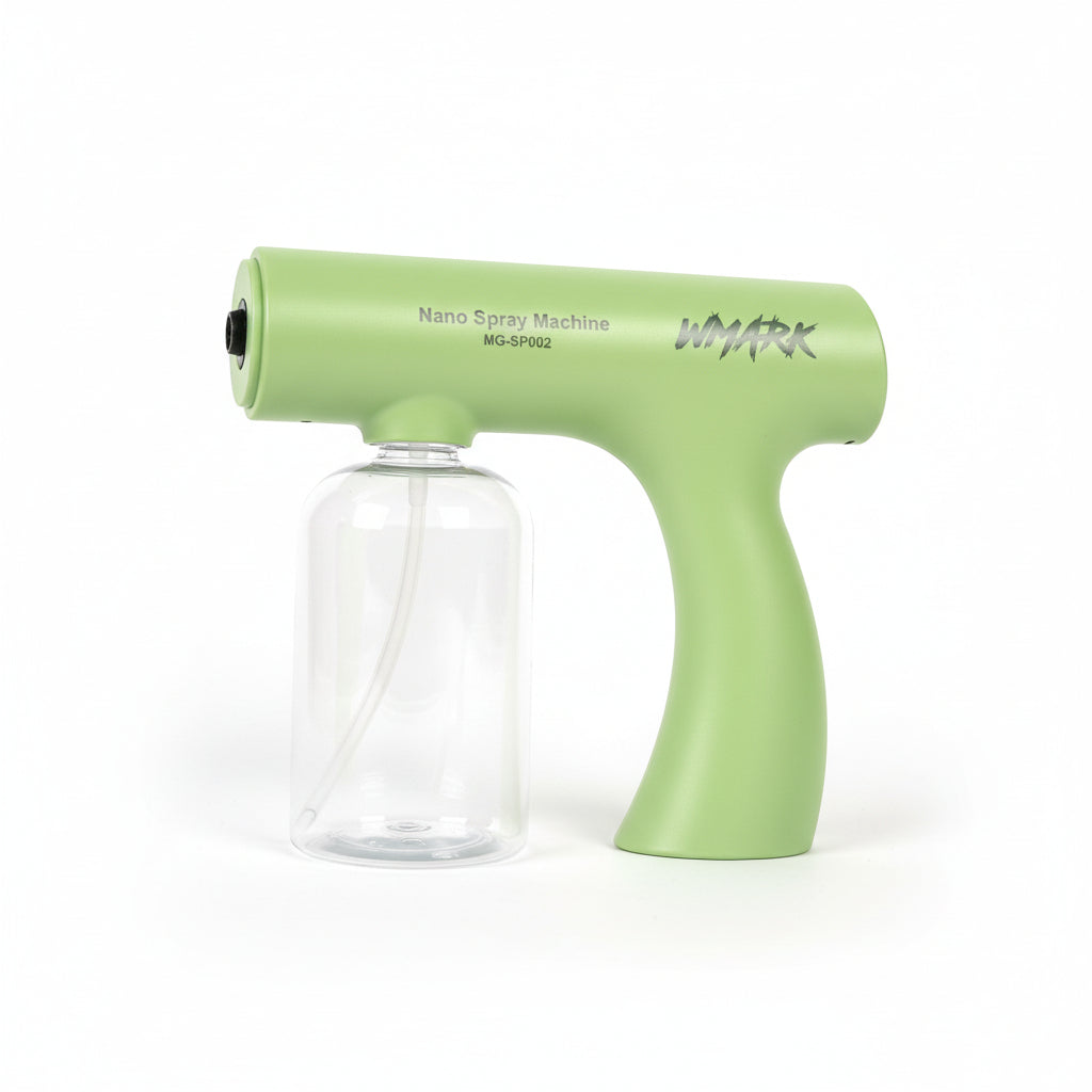 Green nano spray machine with clear container on a blue textured background