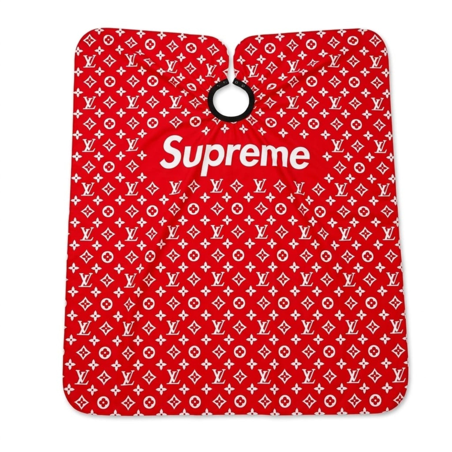 Professional red barber cape with white monogram-style print and black gathered neckline