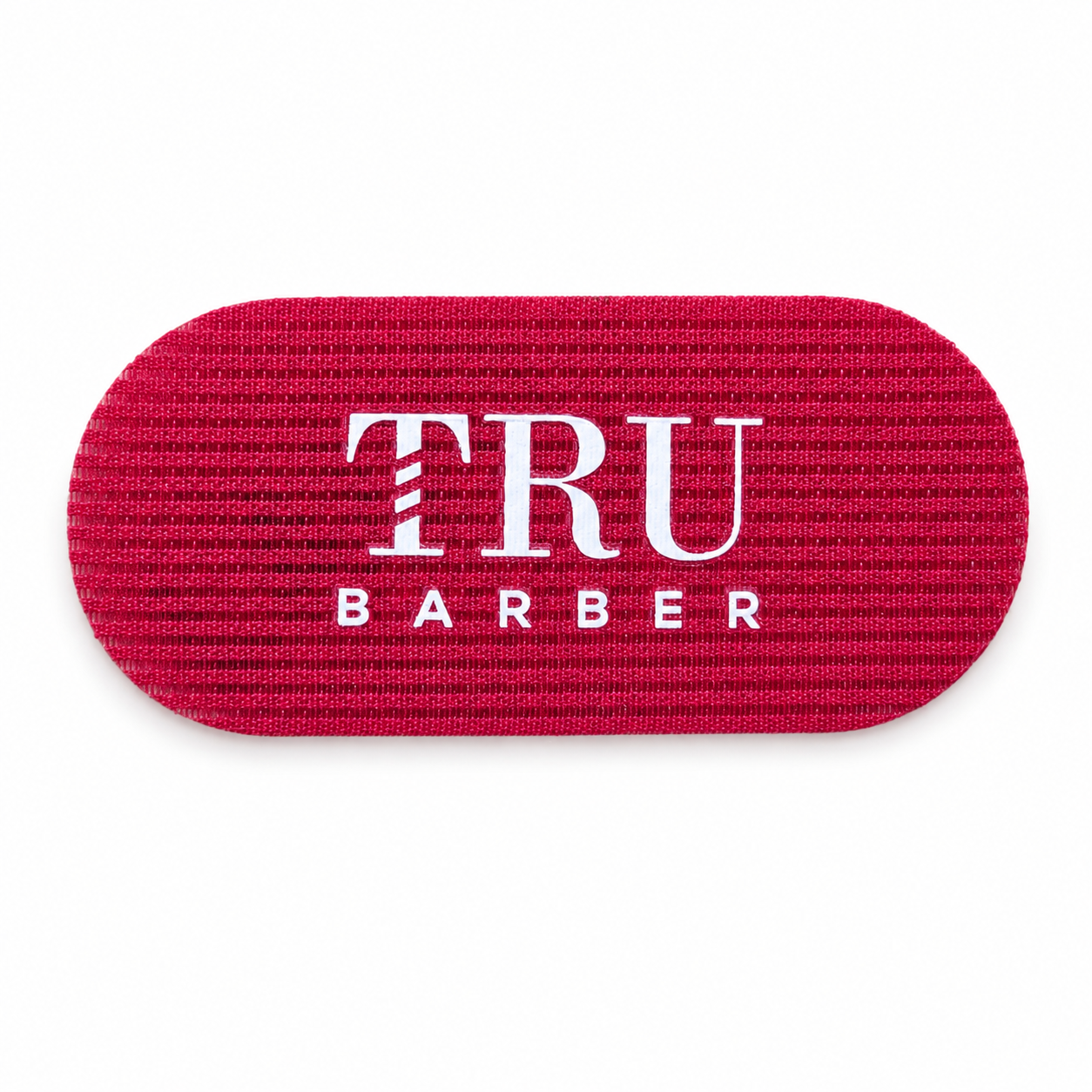 Barber hair gripper product image for sectioning hair during grooming and cutting service.