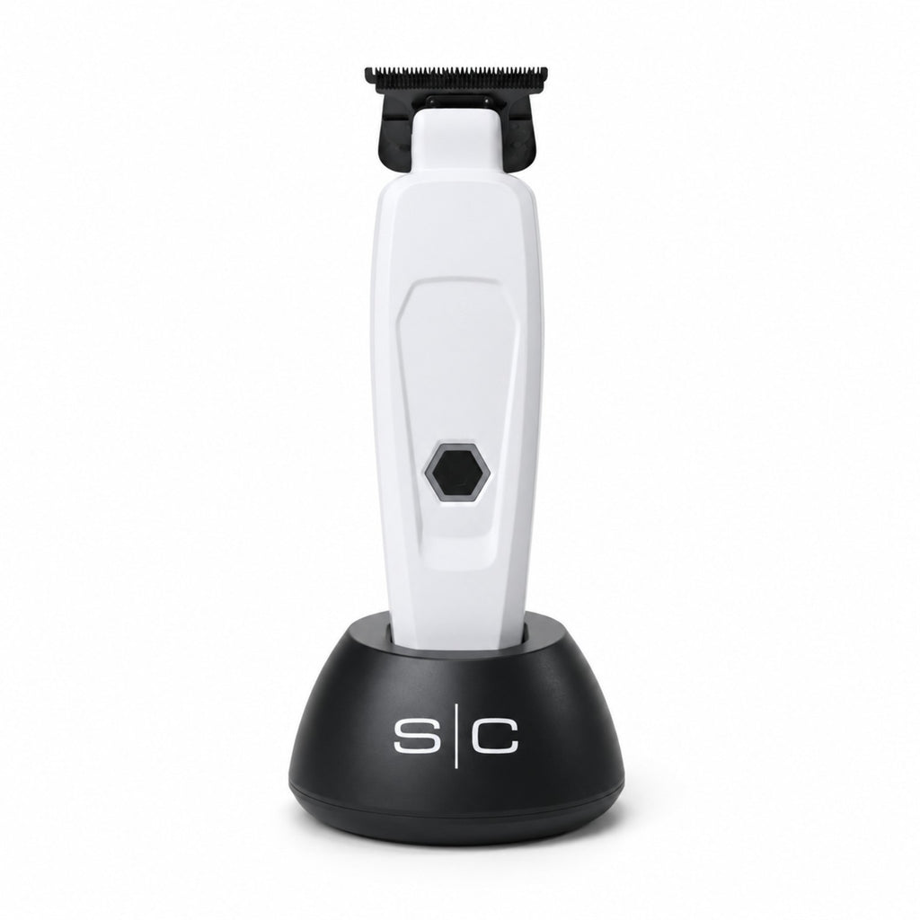 StyleCraft Saber Professional Hair Trimmer in White with charging stand