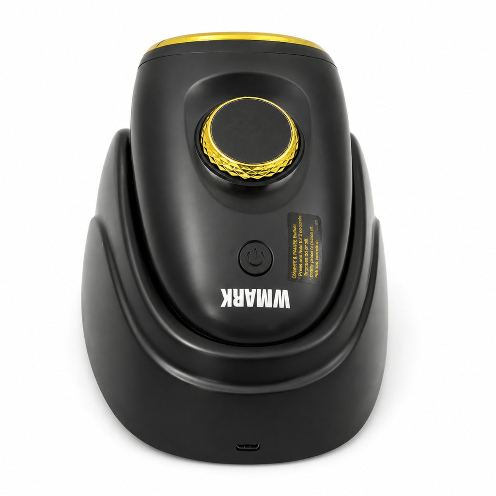 WMARK NG-M2 cordless handheld massager seated in black charging stand with control knob and power button